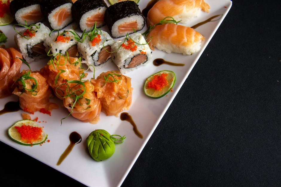 Image of a diverse selection of fusion sushi creations that combine different global flavors